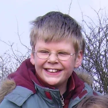 Me aged ten in front of a tree